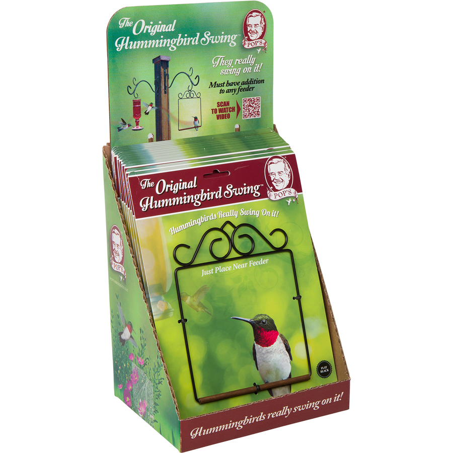 Pop's 2015 counter display: green Original Hummingbird Swing packages with the hand-stained wooden dowel swing
