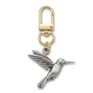 Pewter hummingbird charm on a gold swivel clasp