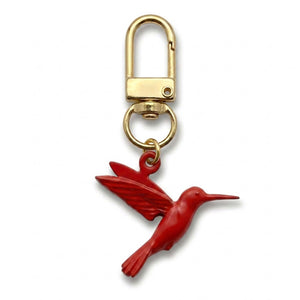 Red hummingbird charm on a gold swivel clasp