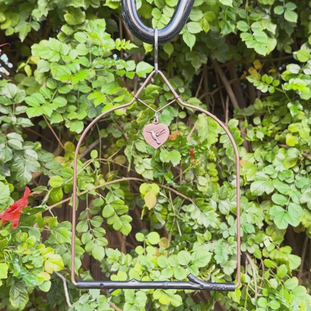 Video: Copper Series swing with black Rustic perch and heart charm among garden leaves